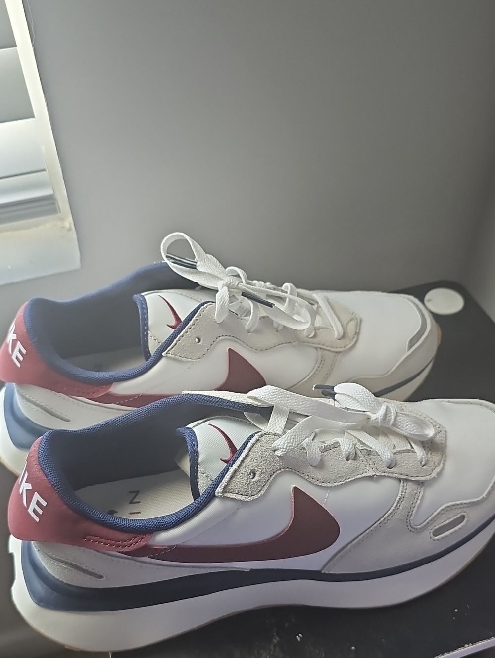Nike White Sneakers with Red Swoosh and Navy Accents